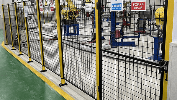Danger signs are around the machine guarding system.