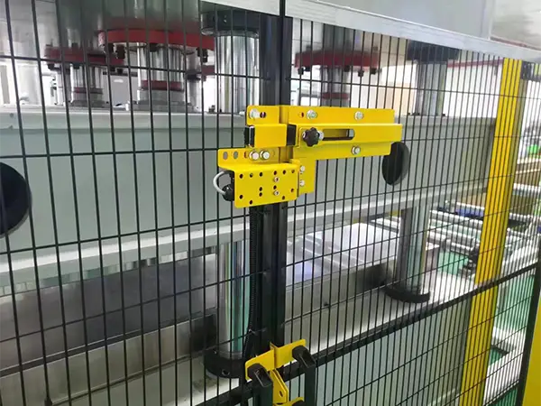 Door lock installed at the entrance of the machine guarding system
