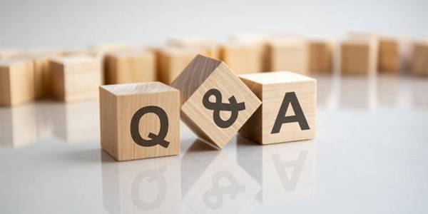 The blocks are engraved with Q&A.