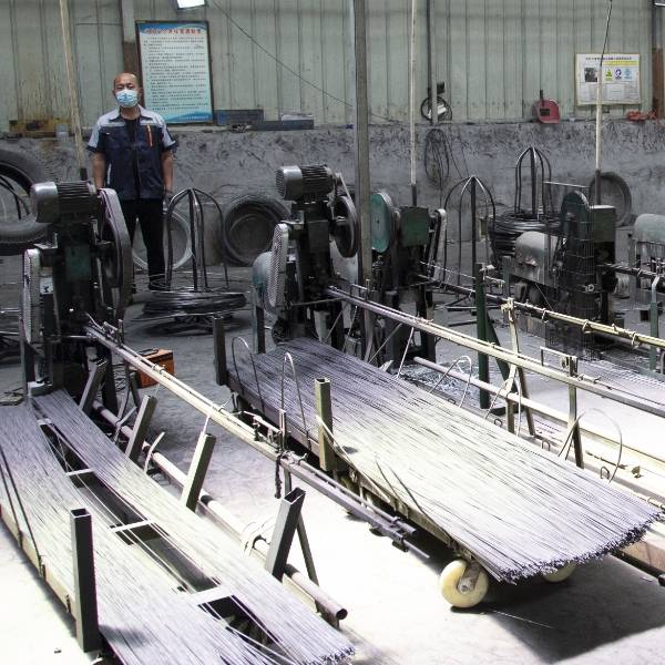 Wire cutters operate to cut the steel wire into desired size.